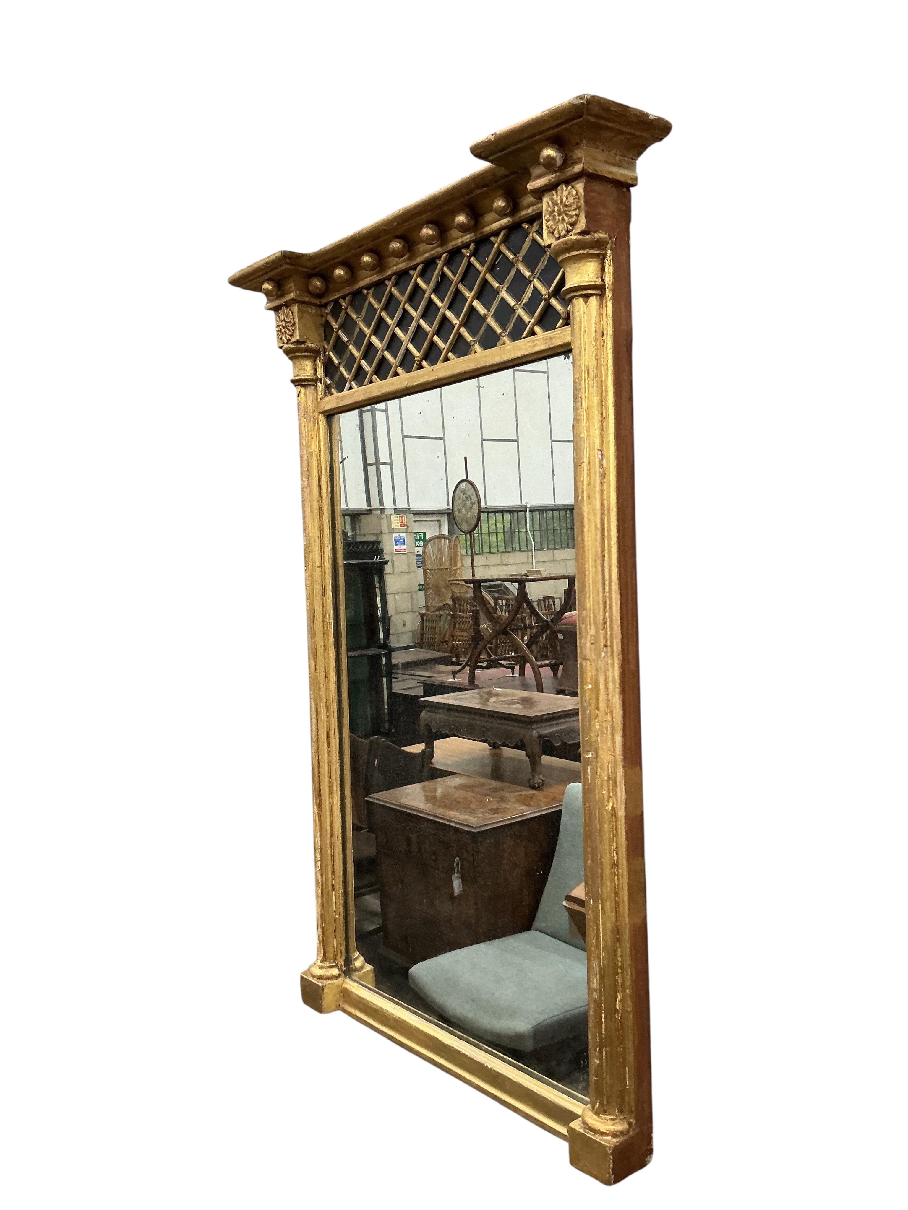 A Regency giltwood and composition pier glass, width 50cm, height 75cm